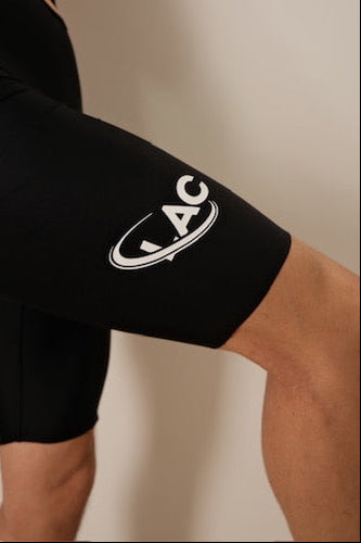 Black elbow pad with 'GAC' logo on a neutral background