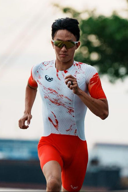 Person running outdoors with a blurred background